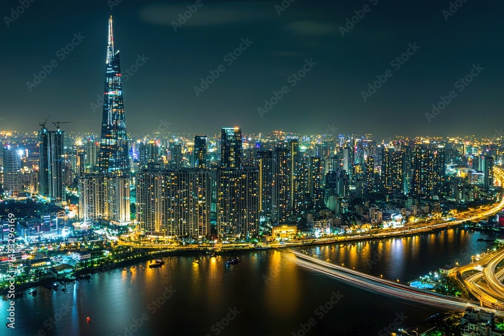 Naklejka premium City skyline and highway with long exposure lights