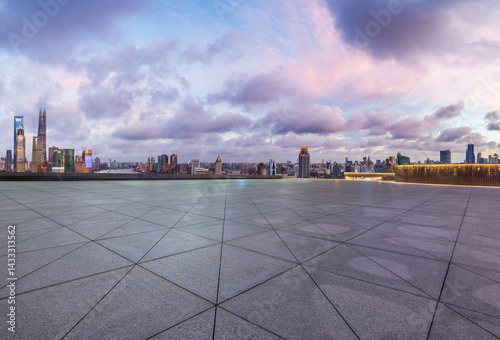 Obraz na płótnie Empty square floor and city skyline with modern buildings at dusk in Shanghai w salonie