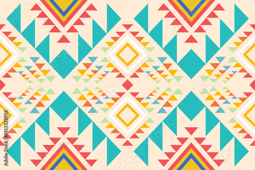 Vibrant tribal pattern featu geometric shapes and bright colors creates a visually engaging design for textiles and backgrounds inspiration.