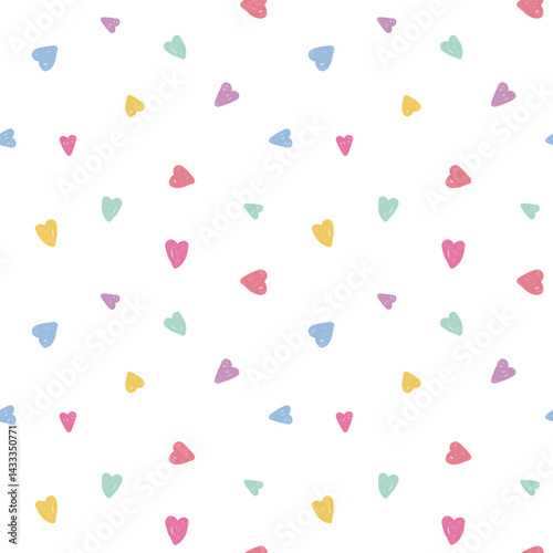 Seamless kids pattern with multicolor pastel hearts on white background. Crayon doodle style. Ideal for baby textiles, nursery decor, wrapping paper, cute stationery, apparel, baby shower themes