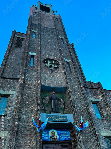Church, sanctuary of St. Anthony of Padua in Częstochowa, Poland. Front wall, above the main entrance with a statue of St. Anthony