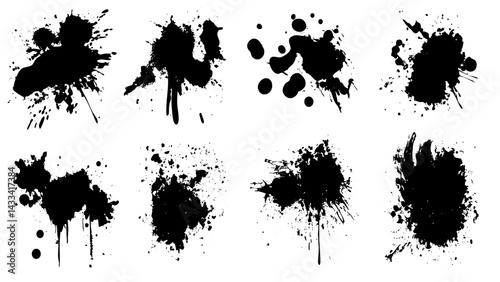 Black ink splatters on white background create abstract patterns and textures