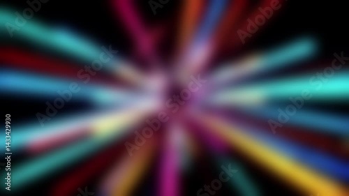 Radiating Rainbow Color Light Beams Animation. Soft blurred colorful rays moving outwards create dynamic motion tunnel effect. Vibrant abstract video background.