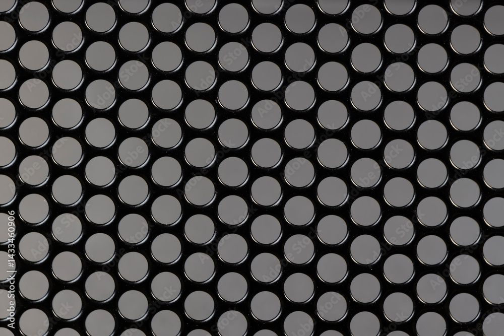 a mesh to protect electrical appliances , a mesh with small holes to protect and provide ventilation, close up