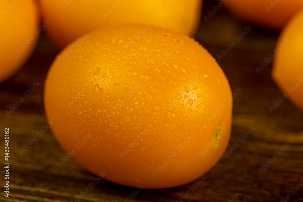 wet tomatoes with dense and juicy flesh, close up