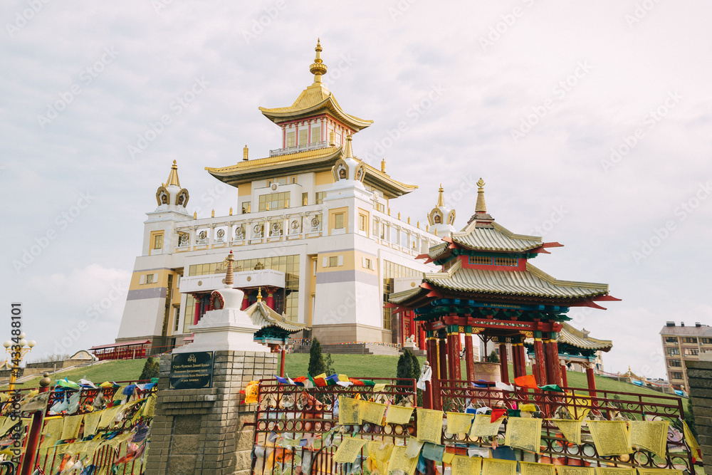 Naklejka premium Khurul in Elista, a vibrant symbol of Buddhism, reflects cultural essence and spirituality, perfect for stock photography.