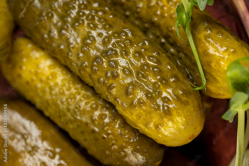 green cucumbers marinated with salt, pickled cucumbers during cooking, close up