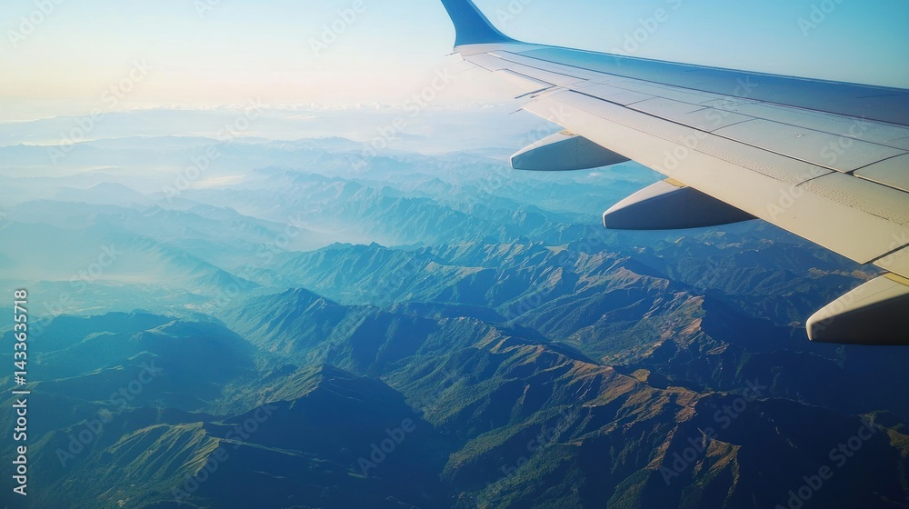 Obraz premium A view from an airplane window with breathtaking scenery.