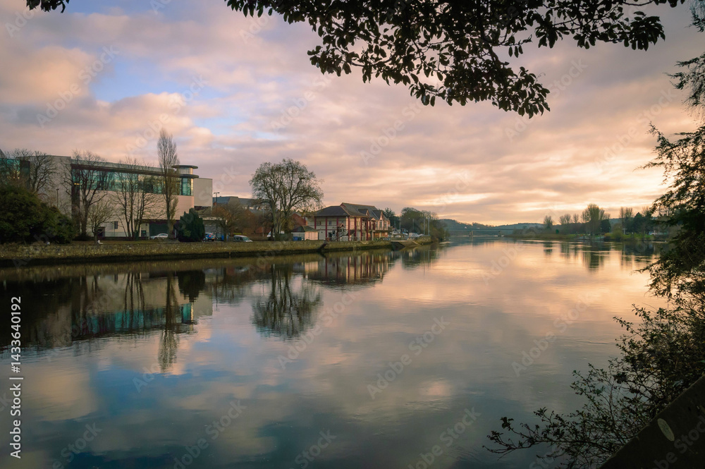 Fototapeta premium sunset over the River Bann in Coleraine, County Derry, Northern Ireland, United Kingdom 