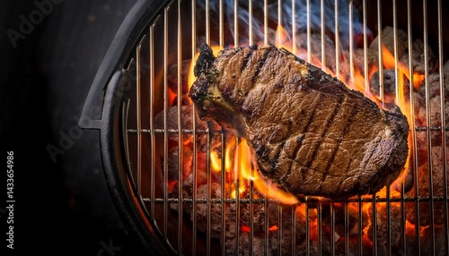 An overhead view of a perfectly grilled ribeye steak.  