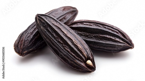 Close-up of Tonka Bean on White Background - Fresh and Healthy Fruit