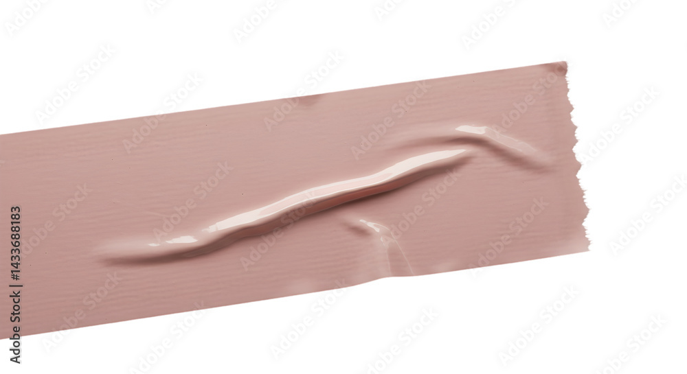 A close up shot of a piece of pink tape with a raised area on a black background in the studio light A close up shot of a piece of pink tape with a raised area on a black background in the studio light