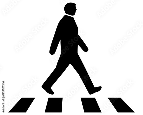 Black silhouette of a person walking on a crosswalk in a city setting