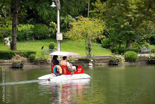 Photography Travelers thai people spinning pedal boats in pond at garden in Bangkok, Thailan