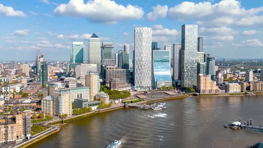 Aerial hyper lapse view of the financial district Canary Wharf in London
