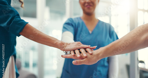 Hands, together and stack with medical team in hospital, support or mission for healthcare collaboration. People, group and doctor synergy in health, partnership and professional motivation in clinic