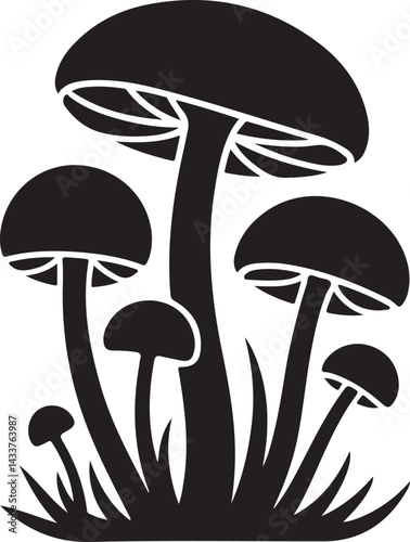 Silhouette of a Cluster of Mushrooms in Grass