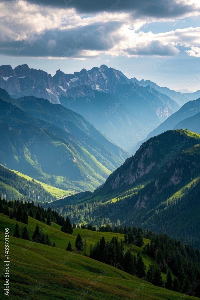 Obraz premium mountains with green grass and trees in the foreground