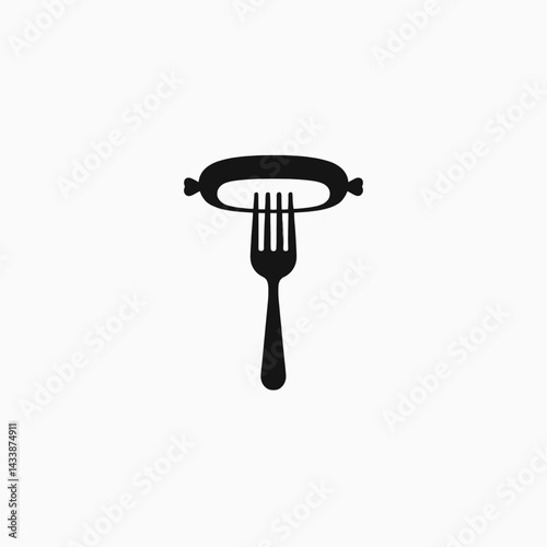 Black sausage on a fork against white background