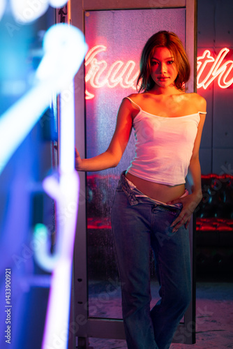Asian young models pose for photoshoots, Women with the brilliant city lights theme
