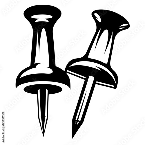 Two black and white push pins provide fastening solutions in artwork
