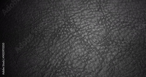 Black leather texture. Leather with Elegant Motion. Video showcasing a luxurious black leather texture with subtle, flowing movement, perfect for sophisticated visuals.