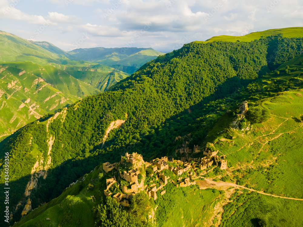 Old stone houses in abandoned Gamsutl mountain village in Dagestan, Russia.