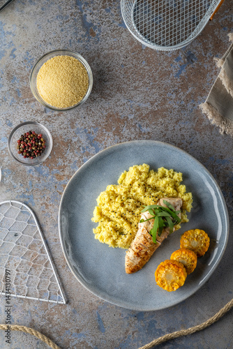 Obraz na płótnie Grilled chicken breast with spiced couscous and roasted corn w salonie