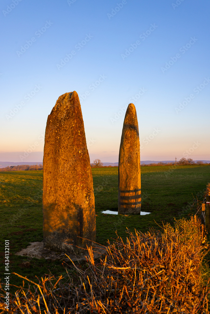 Menhirs of Couches glowing during sunset in Saone et Loire, Bourgogne Franche Comte, France