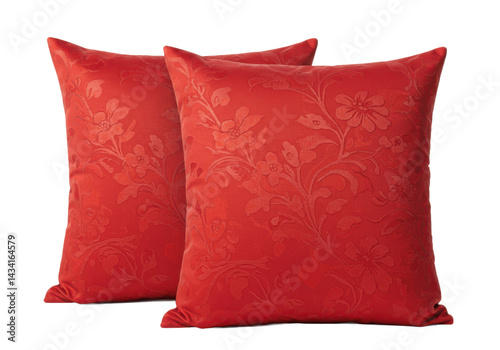 Two red decorative pillows with floral pattern isolated on transparent background