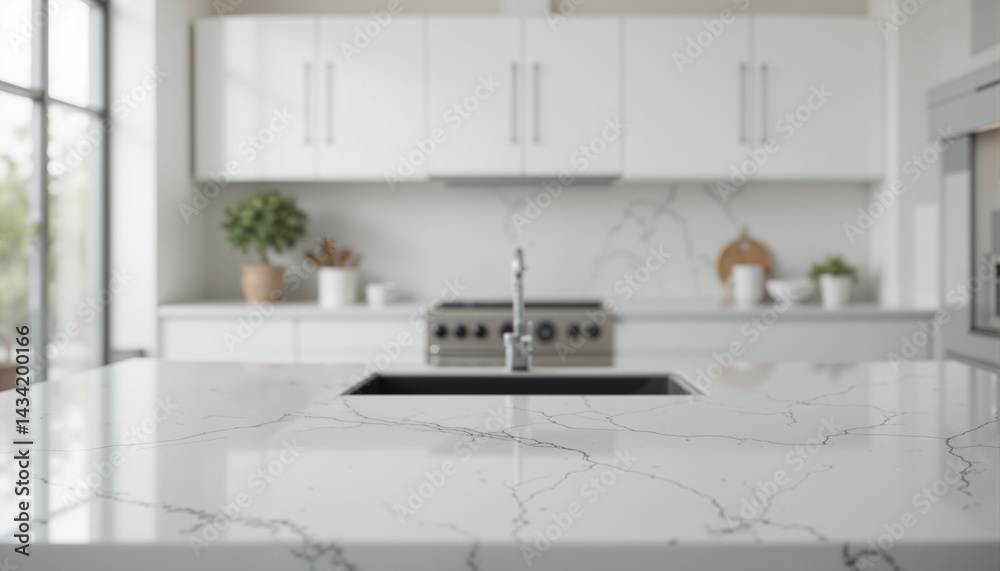 The image shows a kitchen with white cabinets and a marble countertop The image shows a kitchen with white cabinets and a marble countertop