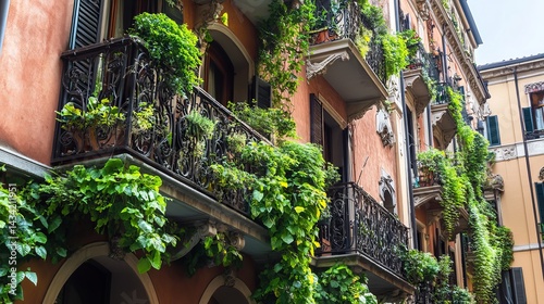 A building in Milan with lush greenery growing on its balconies