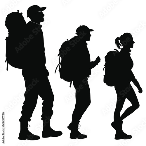 Silhouettes of Three Hikers with Backpacks Walking