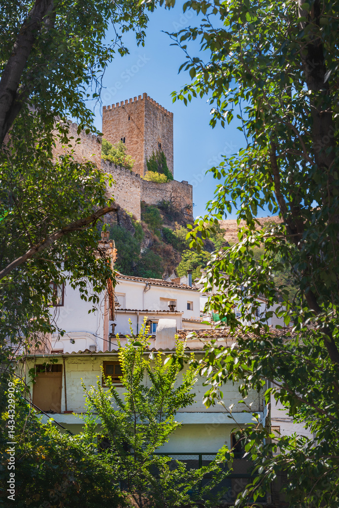 Yedra Castle’s keep tower surrounded by natural scenery, Cazorla, Jaén, Spain
