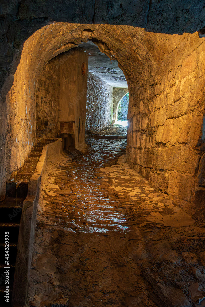 Stone vault over the Cerezuelo River, located under the Church of Santa María in Cazorla, Jaén, Spain.
