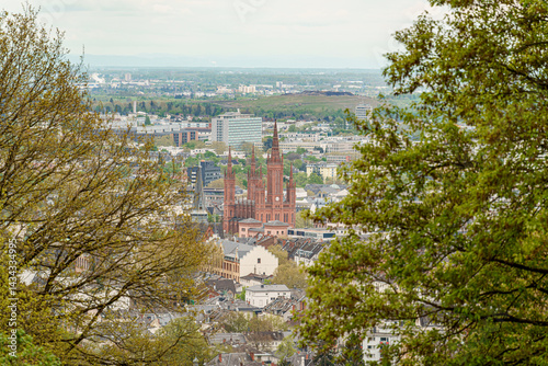 View of the city of Wiesbaden in Germany from the Neroberg mountain in the middle you can see the red evangelical Marktkirche.