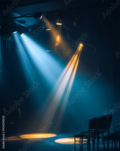 Comedy stage with dramatic blue and yellow spotlights
