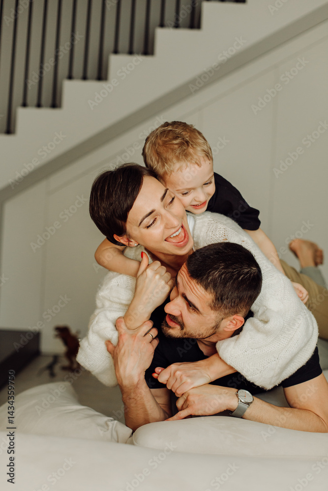Happy family enjoying playful moment together Happy family enjoying playful moment together