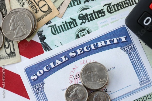 American US dollars money bills, social security number card and calculator on American flag