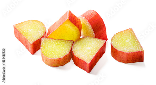 Chopped rhubarb stem isolated on white background. Pile of cut rhubarb pieces with clipping path.