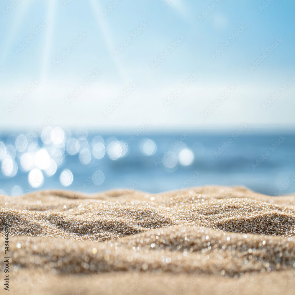 Background with sand in the foreground and sky in the background. summer beach nature with rays of sunlight. golden sand beach. sea water against blue sky with clouds