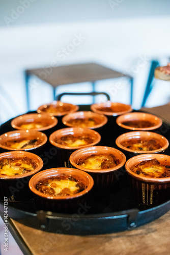 Delicious baked dishes served on a circular tray