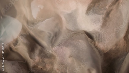 An abstract, muted-colored background with a light, semitransparent piece of cloth
