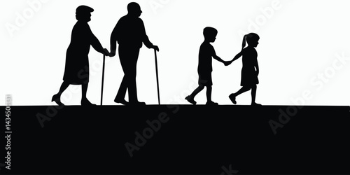 Silhouettes of elderly couple and child walking together
