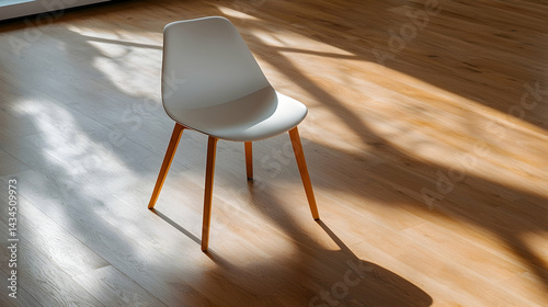 White Plastic Chair on Light Brown Wooden Floor