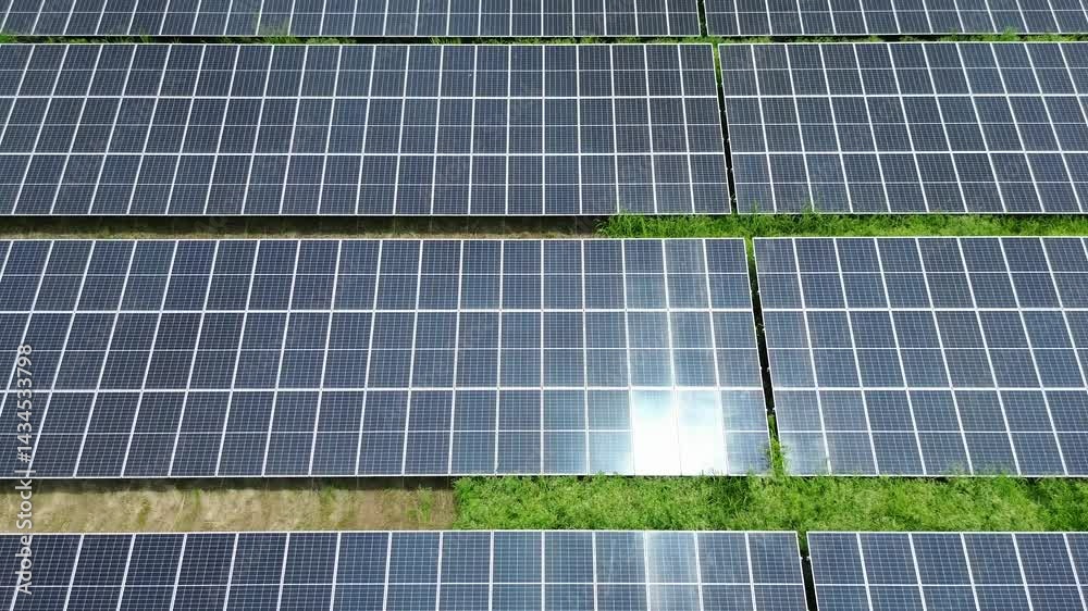 Flying above rows of solar panels generating green energy for sustainable future. High quality 4k footage Flying above rows of solar panels generating green energy for sustainable future. High quality 4k footage