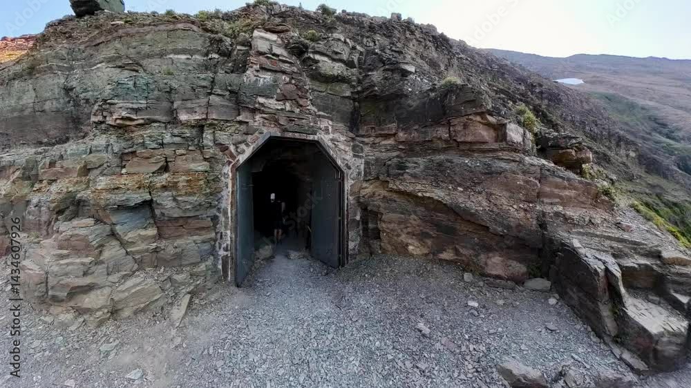 Going through the Ptarmigan Tunnel in Glacier National Park