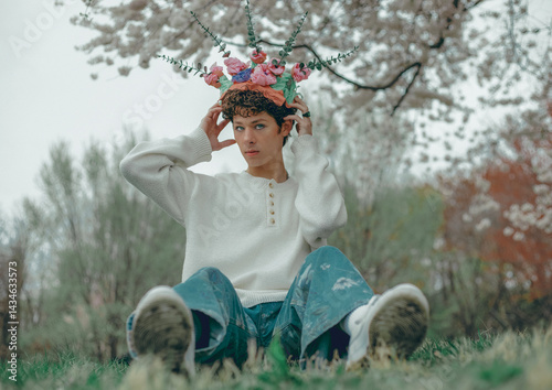 Wallpaper Mural Young guy with a wreath on his head against the background of blossoming trees Torontodigital.ca
