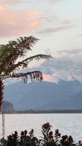 Montreux, Switzerland - Sunset at the lake Geneva, view of the mountains and Mont Blanc, taken from Montreux promenade, French Switzerland