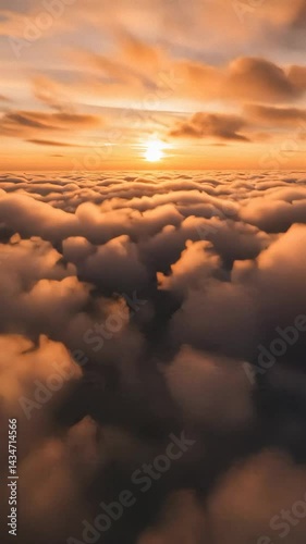 Golden Sunset Above a Sea of Clouds